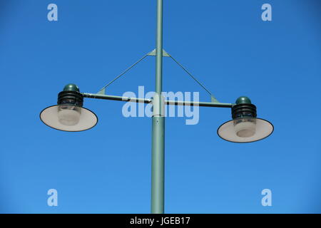 Streetlight against a Clear Blue Sky Stock Photo