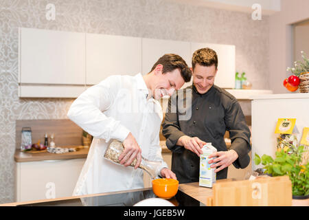 Cook gives a cooking course Stock Photo