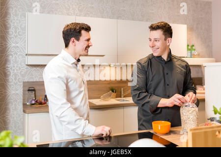 Cook gives a cooking course Stock Photo
