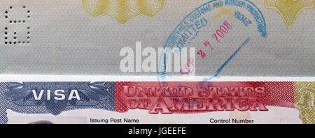 American Visa with stamp in the passport closeup Stock Photo