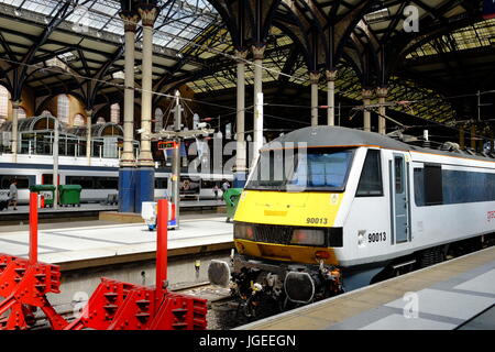 A platform and trains at Liverpool Street Station in London