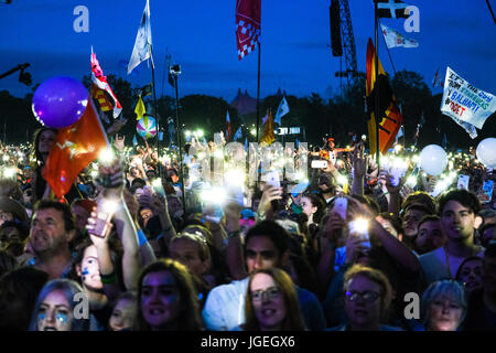 Ed Sheeran at Glastonbury Festival on Sunday 25 June 2017 held at Worthy Farm, Pilton. Pictured: Fans dance and light up the arena as Ed plays . Stock Photo