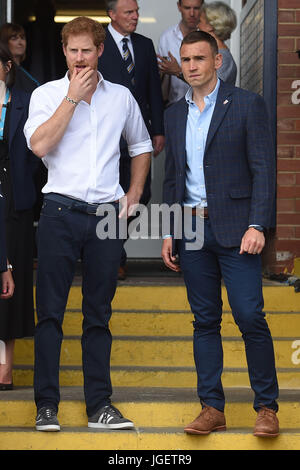 Prince Harry meets former Leeds Rhino rugby league player, Kevin Sinfield during his visit to the Headingley Carnegie Stadium in Leeds, on the first day of his two-day visit to the city. Stock Photo