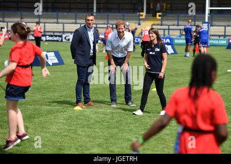 Prince Harry, accompanied by former Leeds Rhino rugby league player, Kevin Sinfield, meets with children, coaches and players during his visit to the Headingley Carnegie Stadium in Leeds, on the first day of his two-day visit to the city. Stock Photo