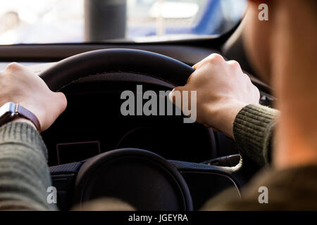 Close up of man driving car Stock Photo