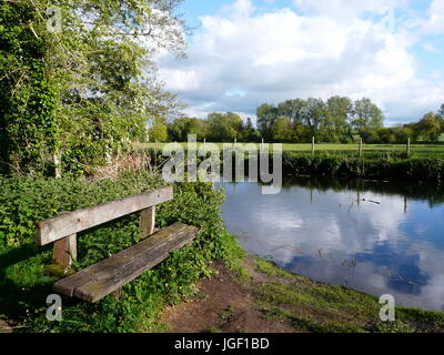 Bench by the River, River Stour, Clare Castle Country Park, Suffolk Stock Photo