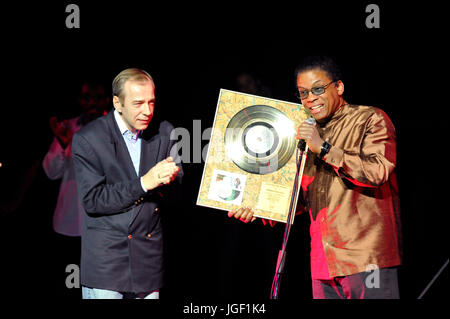 Herbie Hancock presented with Gold Record Award by Kazimierz Pułaski of Sony Music Poland. November 29, 2011 in Sala Kongresowa, Warszawa, Poland. Stock Photo