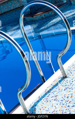 safety rails by a swimming pool Stock Photo - Alamy