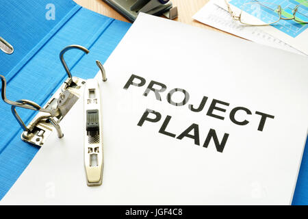 Folder and documents with title project plan. Stock Photo