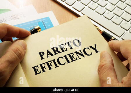 Book with title Pareto Efficiency in an office. Stock Photo