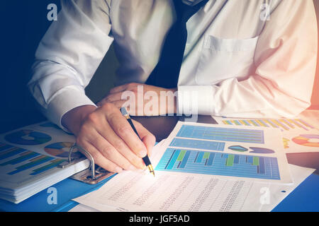Businessman working with financial data in an office. Stock Photo