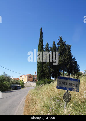 Road sign at entrance to Xanthates Village, Corfu, Greece Stock Photo