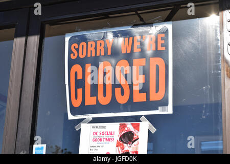 Closed Sign on store window (sorry, we're closed) Stock Photo