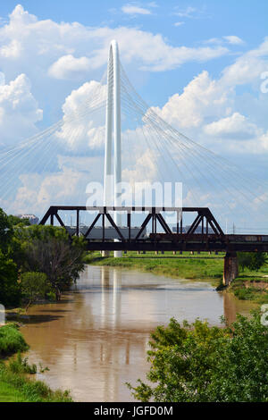 Storm clouds gather over the Margaret Hunt-Hill and Union Pacific RR bridges over the Trinity River just south and west of downtown Dallas Stock Photo