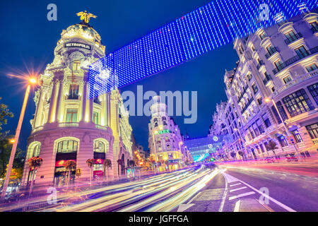 Grassy building and Gran Via street at Christmastime. Madrid. Spain. Stock Photo