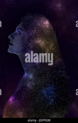 Double exposure of Caucasian woman and stars in outer space Stock Photo