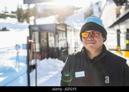 Portrait of smiling man outdoors in snow Stock Photo
