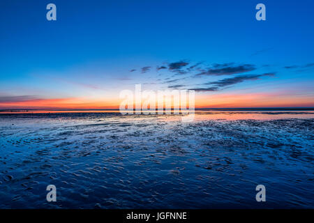 Sunset on tidal flats, Brewster, Cape Cod, Massachusetts, USA. Stock Photo