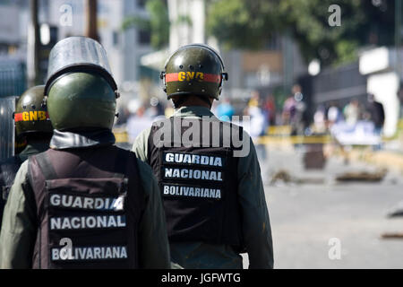 Members of the Bolivarian National Guard disperses demonstrators than try to take the Francisco Fajardo Higway in Caracas during 'El Trancazo' Stock Photo