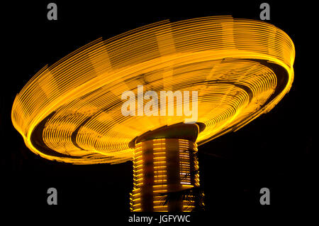 Long Exposure Of A Spinning Carnival Ride Stock Photo - Alamy