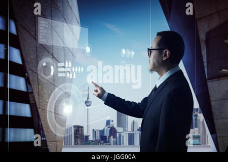 Smart businessman using the modern technologies analyst marketing and finance of business growing. Stock Photo