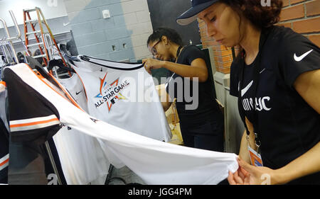 Miami Beach, FL, USA. 6th July, 2017. Lisandra Garcon, left, and Marisa Vargas, prepare merchandise Thursday, July 7, 2017, at the Miami Beach Convention Center where the Major Leaqgue All Star Game FanFest will open Friday morning Credit: Sun-Sentinel/ZUMA Wire/Alamy Live News Stock Photo