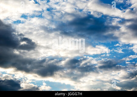 grey clouds and white clouds on bright blue sky. Ominous sky. The soft cloud is on the blue sky Stock Photo