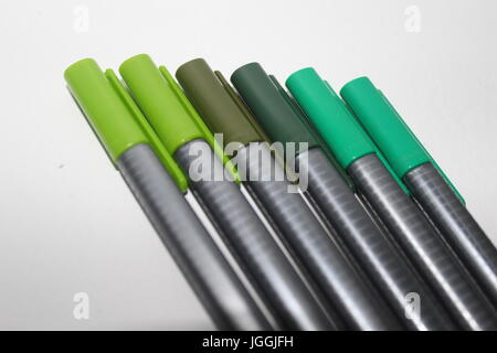 Row of green pens Stock Photo