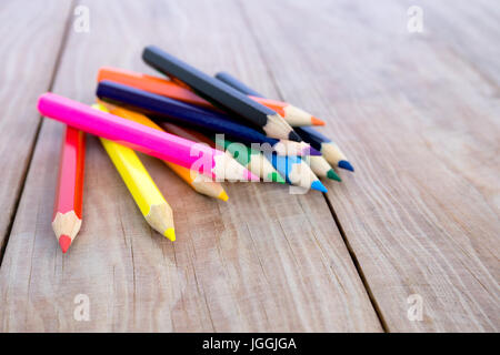 Selective focus of pencil colors on wood table Stock Photo