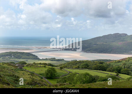 The mouth of the Mawddach estuary with the Barmouth rail bride crossing. Stock Photo