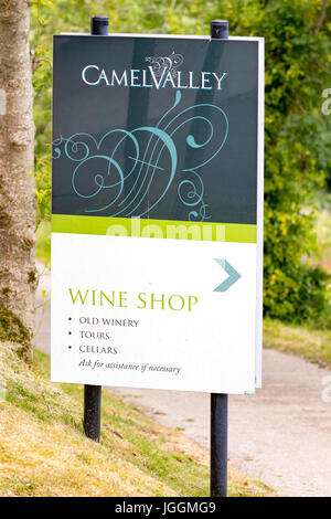 Signage at the popular and award winning Camel Valley Vineyard showing directions to the wine shop, tasting, tours and cellars Stock Photo