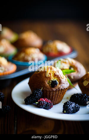 sweet muffins with berries inside Stock Photo - Alamy