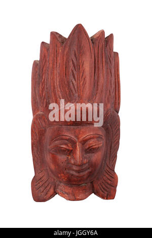 Wooden carved original Sri Lankan or Indian ethnic brown mask with human face, head of red wood isolated on white background Stock Photo