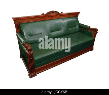 Green leather retro classic style coach sofa with brown wooden frame isolated on white, close up, high angle side view Stock Photo