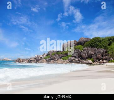 Scenic  white sand beach with granite boulders,  La Digue, Seychelles Stock Photo