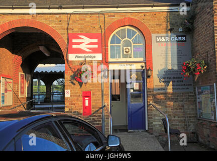British Rail double arrow logo sign taxi office, railway train station, Woodbridge, Suffolk, England, UK Stock Photo