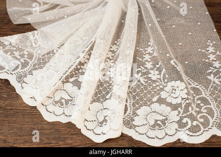 Close up of Beautiful White Tulle. Sheer Curtains Fabric Sample. Texture, Background, Pattern. Wedding Concept. Interior Design. Vintage Lace Tulle Ch Stock Photo