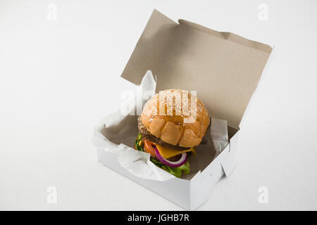 High angle view of cheese burger in box on table Stock Photo