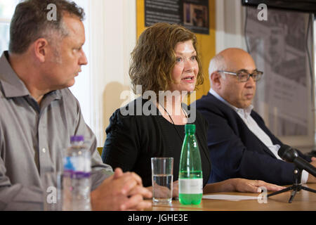 Moscow based lawyer Glenn Kolleeny (right) with stepfather Michael Calcutt (left) and mother Dana Madsen-Calcut (centre) of American student Colin Madsen, 25, who was found dead in a Siberian forest on April 4 2016, speak to the media as they call on Russian President Vladimir Putin to reopen the case. Stock Photo