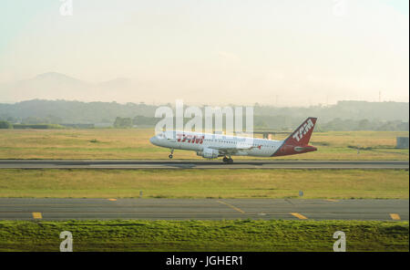 Curitiba, PR, Brazil - December 26, 2016: TAM Airlines plane taking flight at Internacional Afonso Pena airport in Curitiba. Stock Photo