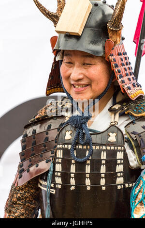 Japan, Tatsuno. April Festival. Smiling man dressed as Samurai warrior ...