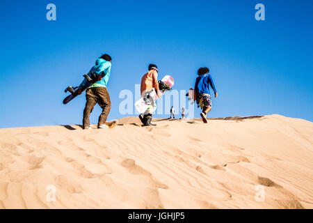 Sandboarding on Atacama Desert. Iquique, Tarapaca Region, Chile. 15.11.15 Stock Photo