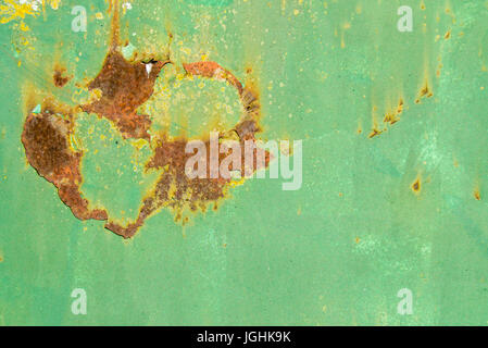 Rust on old green painted metal Stock Photo