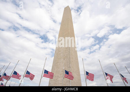 The Washington Monument surrounded by flags in Washington, DC Stock Photo