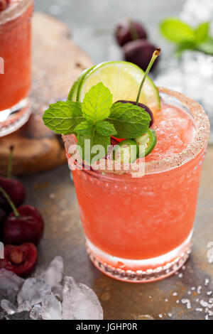 Refreshing summer cocktail with cherry Stock Photo