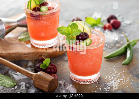 Refreshing summer cocktail with cherry Stock Photo