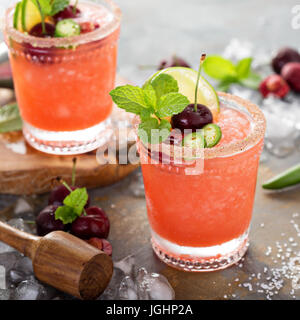 Refreshing summer cocktail with cherry Stock Photo