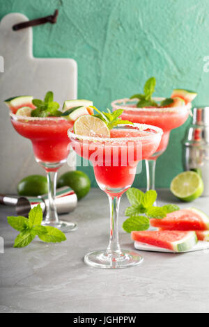 Refreshing summer watermelon margaritas with lime Stock Photo