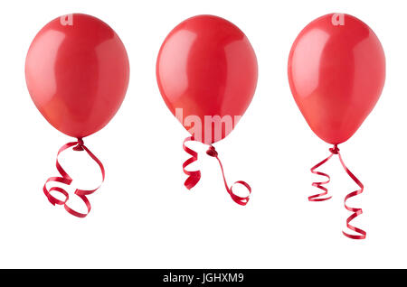 Three red party balloons, tied with curly ribbons, isolated on a white background. Stock Photo