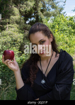 Woman in dark dress Stock Photo